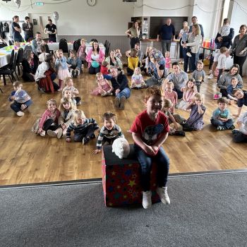 Snowy the rabbit entertaining children at a Ashby party event