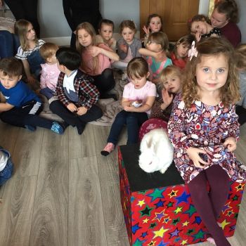 Kids Party Magician Long Eaton | Magic & Fun Shows Kids' party photo with Snowy the rabbit in Long Eaton