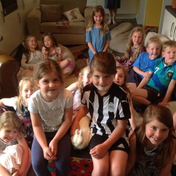 Stoke-on-Trent Kids Magician | Children’s Party Fun Children's party photo with Snowy the rabbit in Stoke-on-Trent