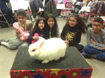 A treasured Derby memory – the birthday boy or girl holding Snowy while friends cheer in the background.