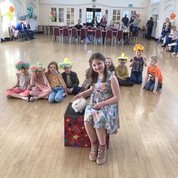 A happy memory in Mansfield as the birthday child beams with joy at their magical celebration.