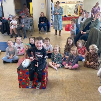 Children’s entertainer with Snowy the live rabbit at a birthday party in Beeston