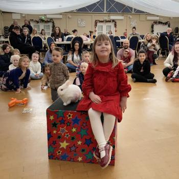 Children’s entertainer with Snowy the live rabbit at a birthday party in Burton Upon Trent