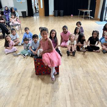 Children’s entertainer with Snowy the live rabbit at a birthday party in Chilwell