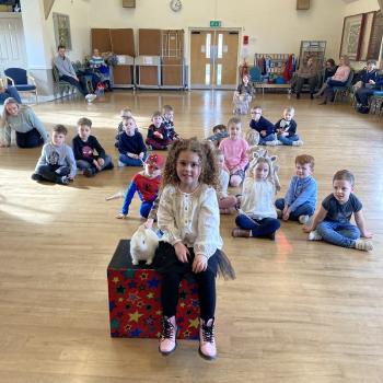 Children’s entertainer with Snowy the live rabbit at a birthday party in Derby