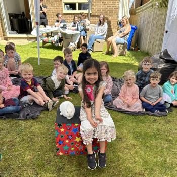 Children’s entertainer with Snowy the live rabbit at a birthday party in Grantham