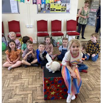 Children’s entertainer with Snowy the live rabbit at a birthday party in Lichfield