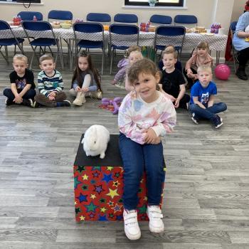 Children’s entertainer with Snowy the live rabbit at a birthday party in Mansfield