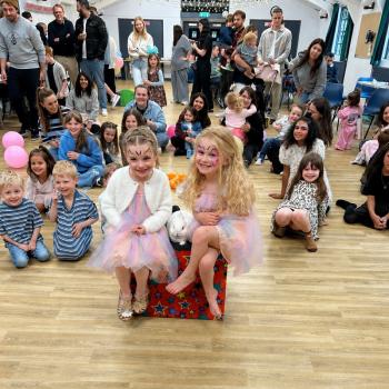 Children’s entertainer with Snowy the live rabbit at a birthday party in Matlock