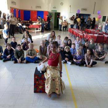 Children’s entertainer with Snowy the live rabbit at a birthday party in Peak District
