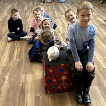 Children’s entertainer with Snowy the live rabbit at a birthday party in West Bridgford