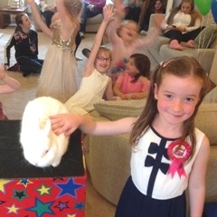 Laughter and clapping fill the air during a lively Mansfield birthday party.