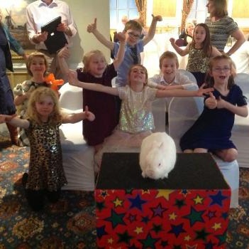 Children’s entertainer with Snowy the live rabbit at a wedding in Castle Donington