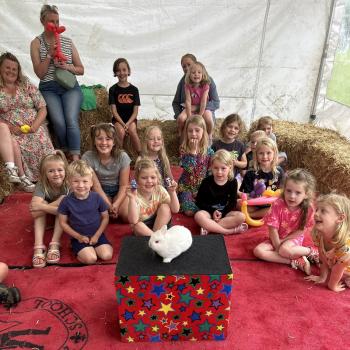 Children’s entertainer with Snowy the live rabbit at an event in Loughborough