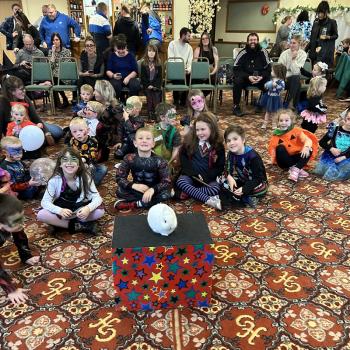 Children’s entertainer with Snowy the live rabbit at an event in Matlock