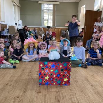 Children’s entertainer with Snowy the live rabbit at a fun day in the Peak District