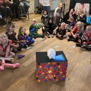 Children’s entertainer with Snowy the live rabbit at a party in Sheffield