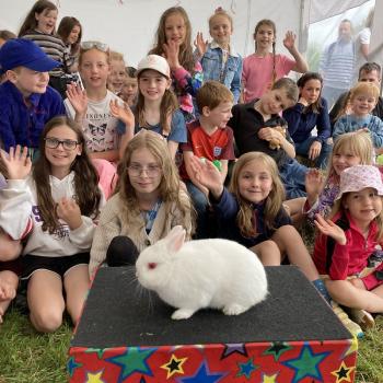 Children’s entertainer with Snowy the live rabbit at an event in Stoke On Trent