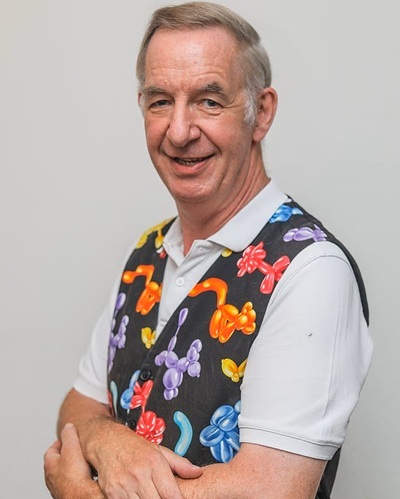 Photograph of Magic Stuart smiling 