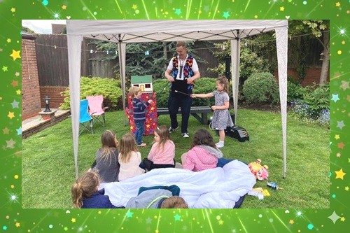 Magic Stuart performing live children’s magic show with Snowy the real magic rabbit at a Derby birthday party