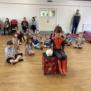 Magic Stuart entertaining children with an engaging magic show at a lively birthday party in Derby