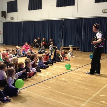 Children's entertainer performing an interactive fun magic show at a school in Ilkeston