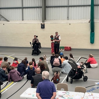 Children's entertainer performing an interactive fun magic show at a birthday party in Ashby De La Zouch