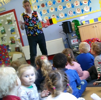 Children's entertainer performing an interactive fun magic show at a school in Bakewell