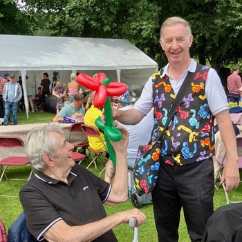 Children's entertainer performing an interactive fun magic show at a fun day in Chesterfield
