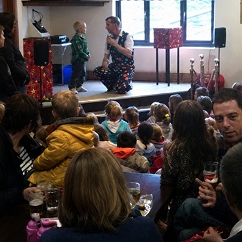 Children's entertainer performing an interactive fun magic show at a birthday party in Lichfield