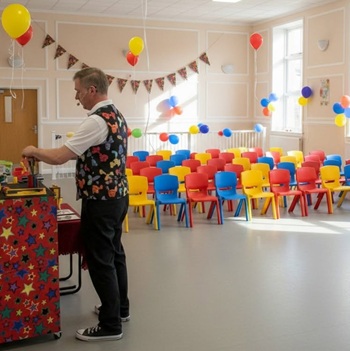 Children's entertainer performing an interactive fun magic show at a birthday party in Sutton In Ashfield