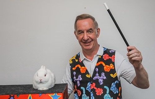 Scan of a national newspaper article featuring Magic Stuart with Snowy.