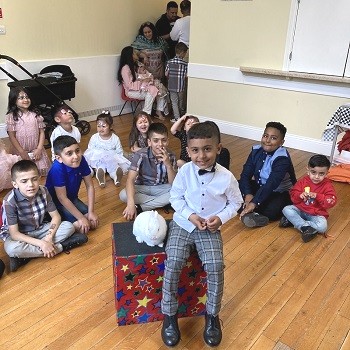 Magic Stuart hosting a fun-filled birthday party with magic, games, and entertainment for kids in Derby