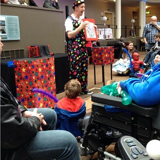 Magic Stuart performing an engaging magic show for children at a fun birthday party