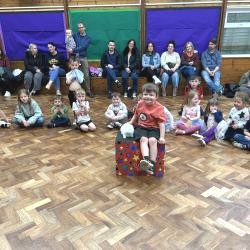 Snowy the live rabbit appearing at a Nottingham children's birthday party Snowy the live white rabbit meeting happy children at a Nottingham party venue