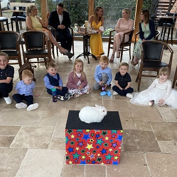 Magic Stuart performing a magic show for children at a Derby wedding