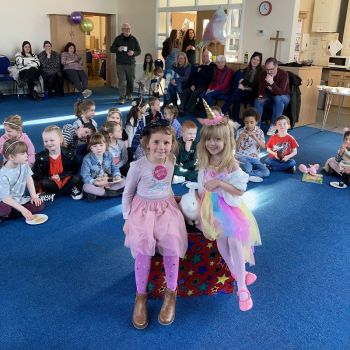 Happy children at a birthday celebration with a rabbit in Stafford.